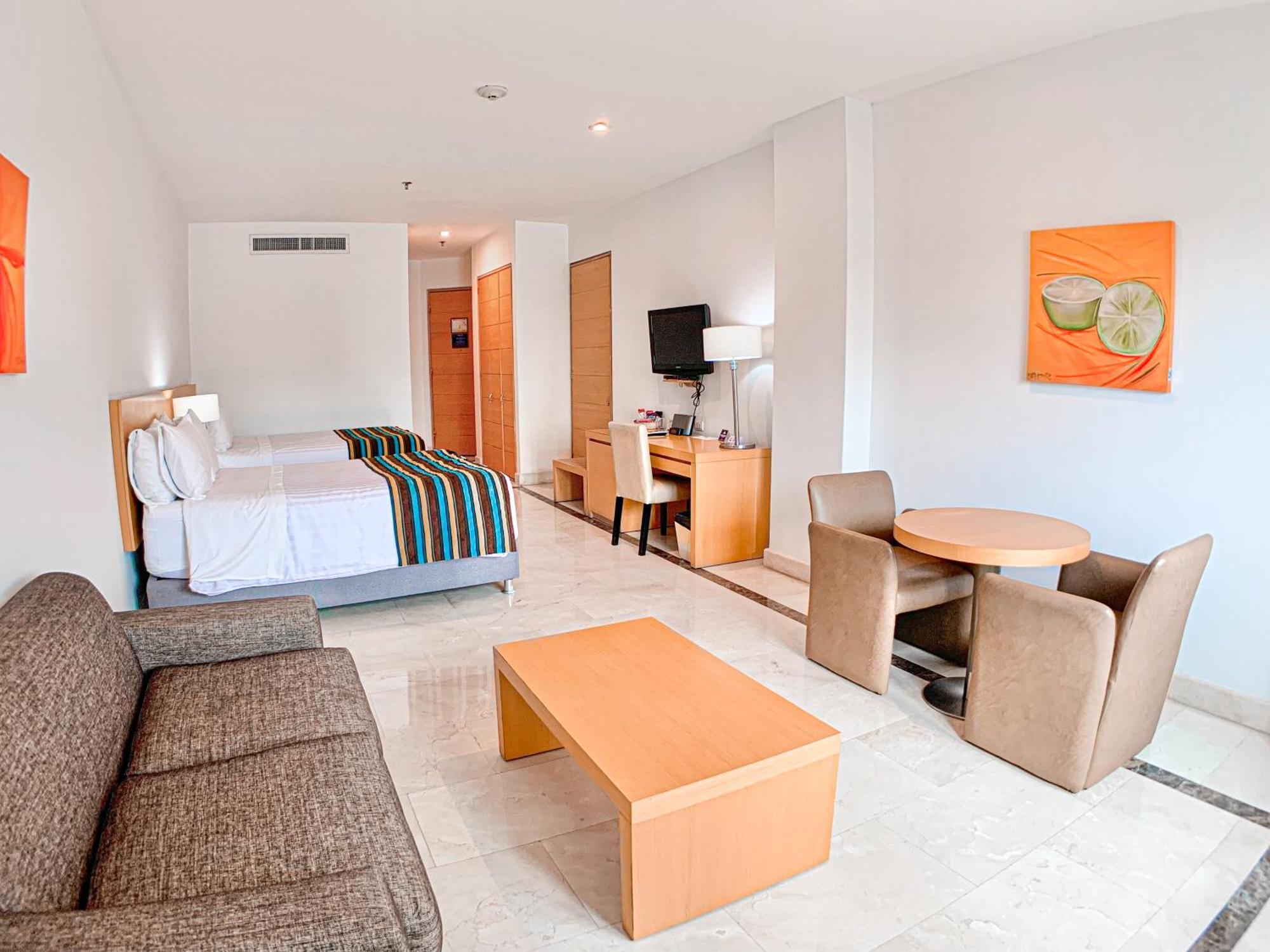 Hotel Dann Carlton Barranquilla Y Centro De Convenciones מראה חיצוני תמונה A room at the hotel